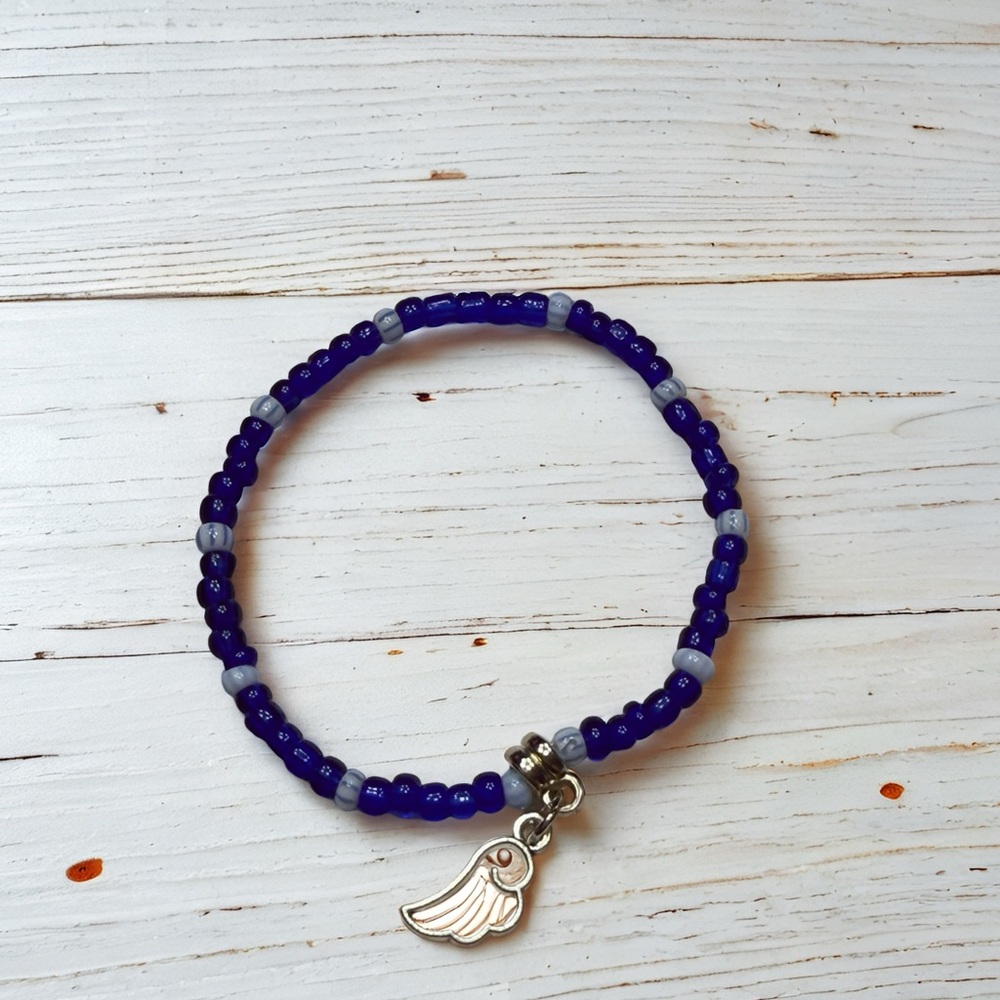 Cobalt Blue Beaded Bracelet with Pink Wing Charm - Picture 6 of 6